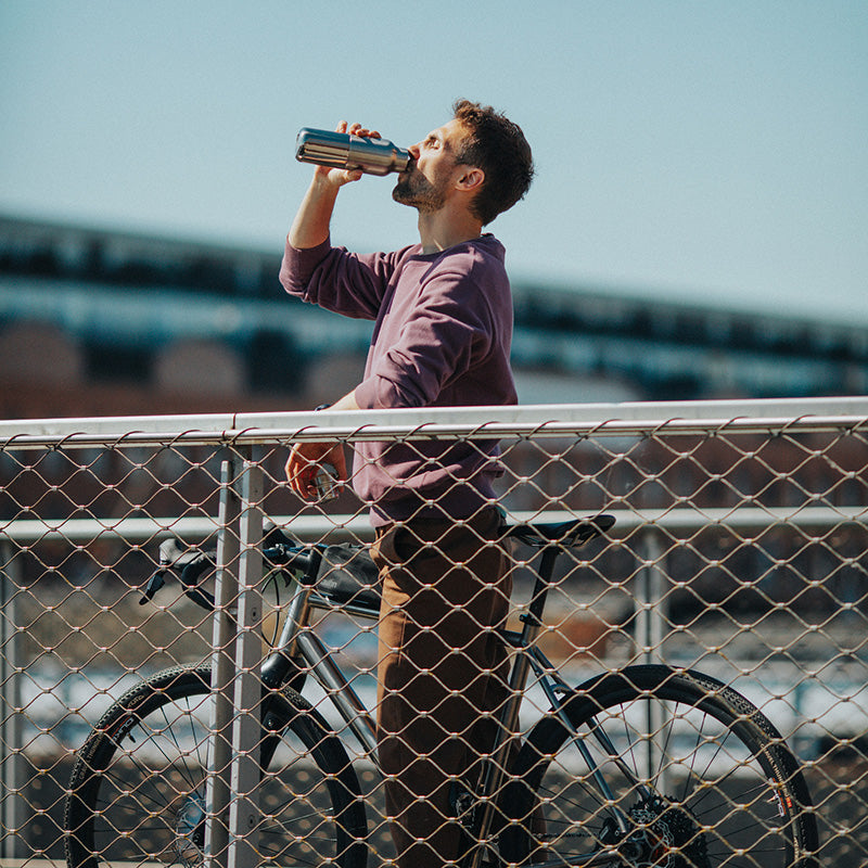 12oz-rise-reflect-with-bamboo-cap-y6 16oz_rise_reflect_man_bike_square.jpg