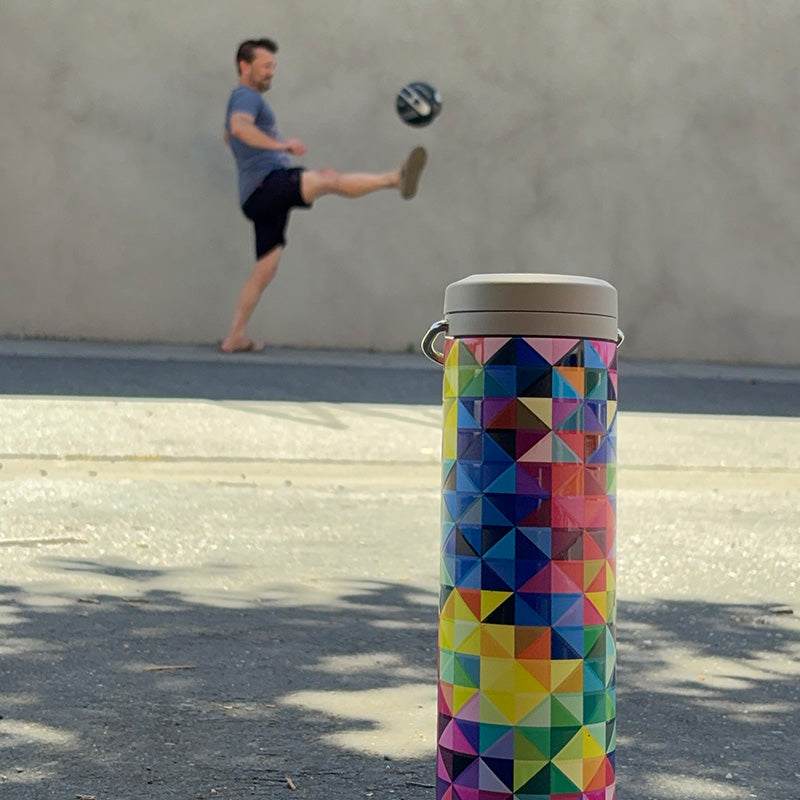 20oz-tkwide-with-twist-cap-mosaic-t0 20oz_tkwide_bottle_seasonal_mosaic_soccerball_player_square.jpg
