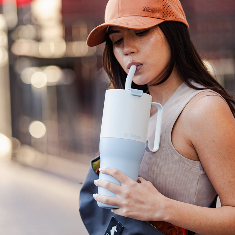36oz-rise-tumbler-with-straw-lid-e8 36oz_rise_tumbler_straw_girl_sip_square.jpg