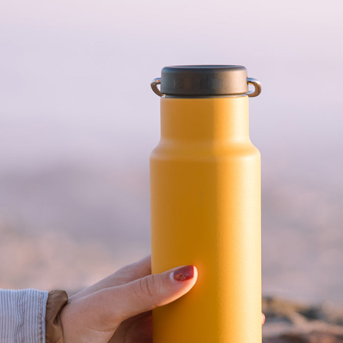 classic-loop-cap-q4 K12VCNPPL-MG-loop-cap_yellow_bottle_lifestyle.jpg