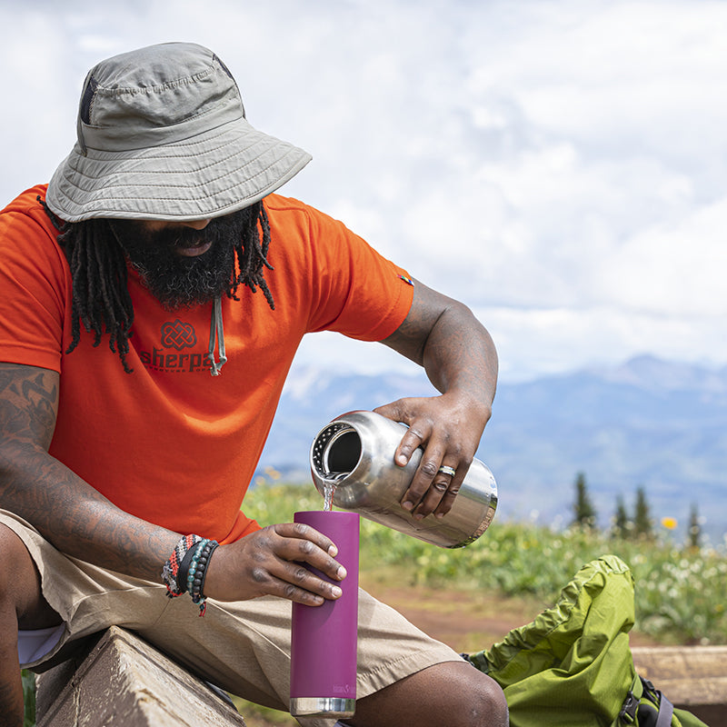 64oz-tkwide-with-loop-cap-p0 tkwide_64oz_bottle_backpacker_mountains_filling_square.jpg